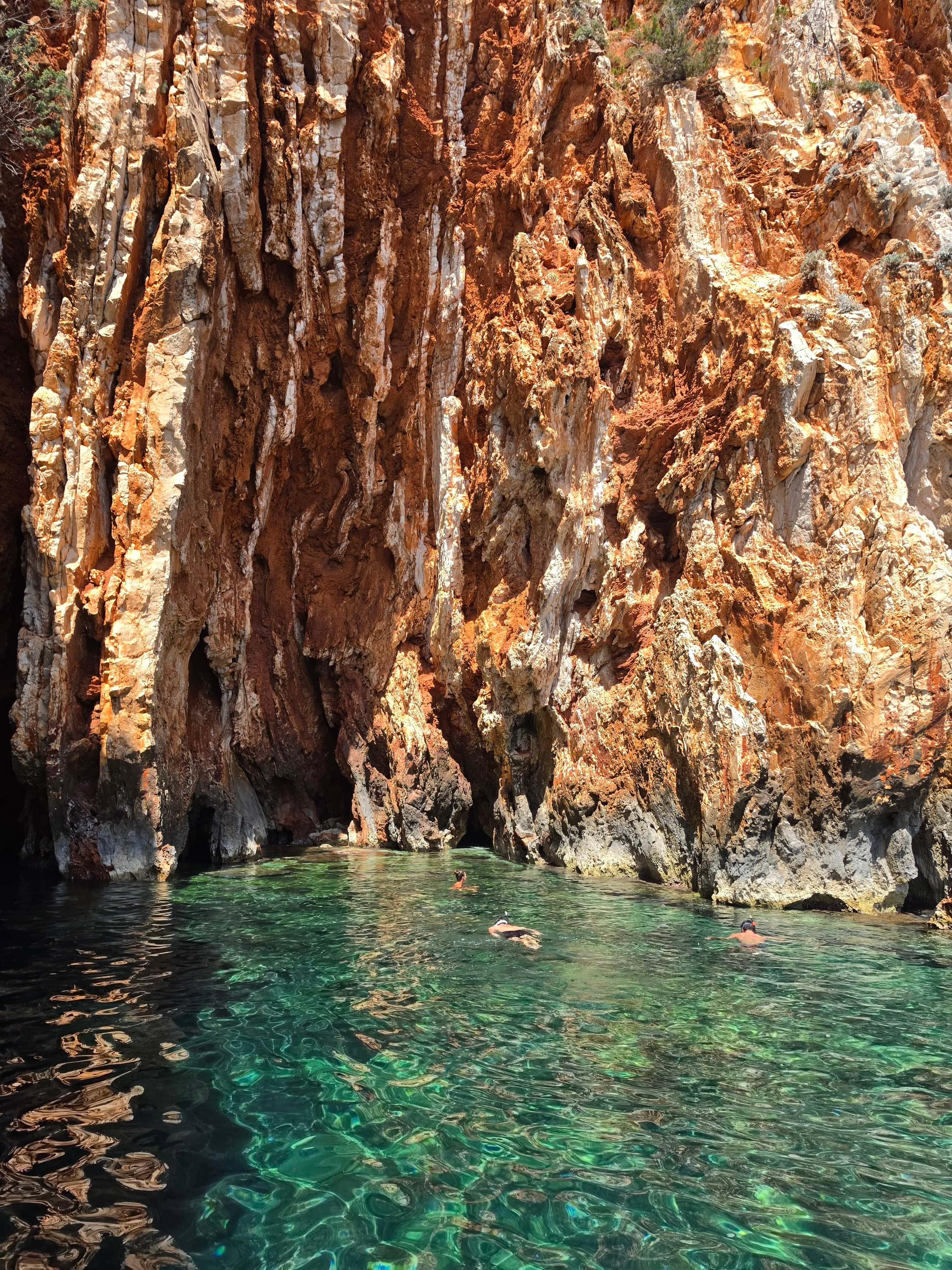 Red Rocks cliffs on the southern coast of Hvar above turquoise sea