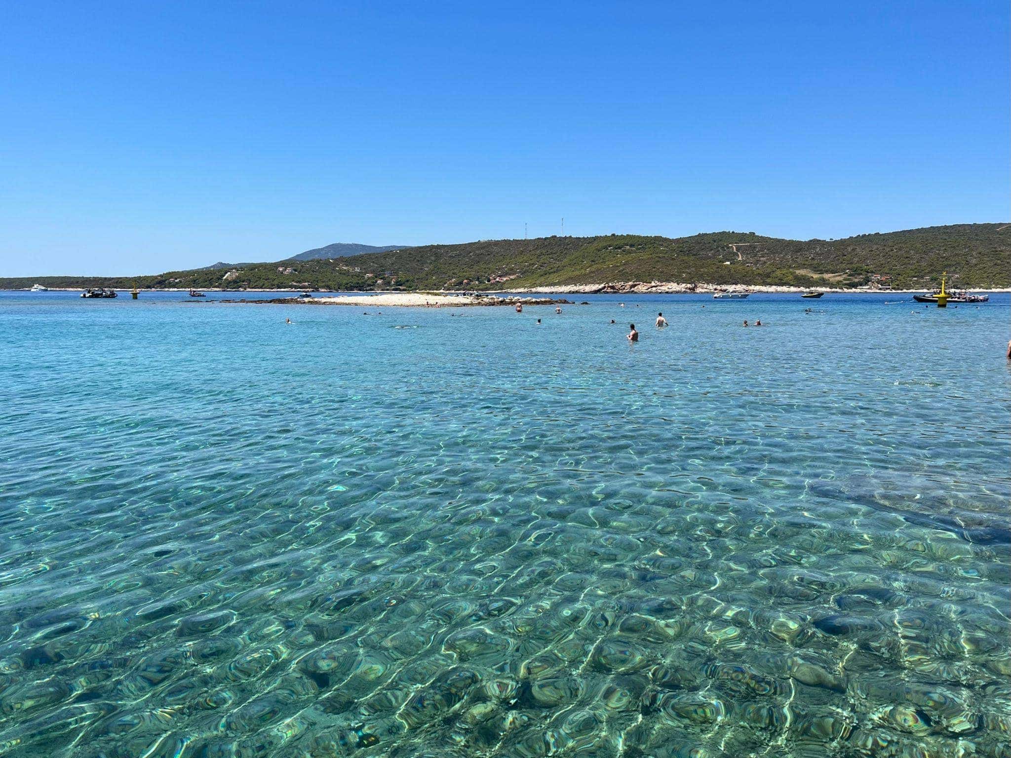 Mlini beach in the Pakleni Islands with crystal clear Adriatic sea