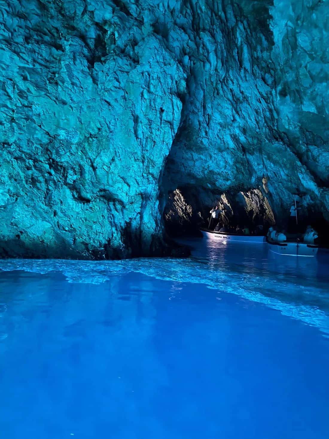 Blue Cave on Biševo island glowing with blue light during boat tour from Hvar